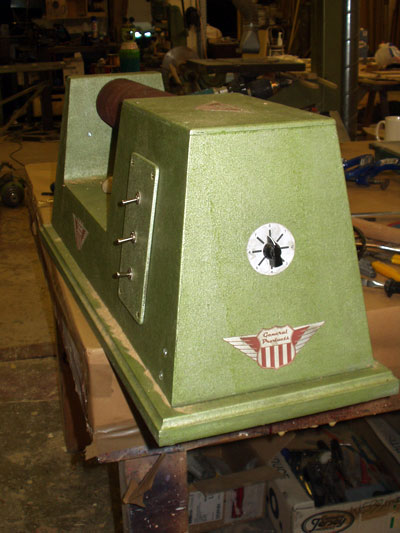 End view of an old fashioned free-standing sanding machine