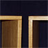 Close-up detail of a wooden bedside table