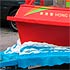 Close-up detail of a parade float in the form of a red boat