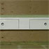 Close-up detail of a white coffee table