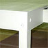Close-up detail of a white coffee table