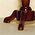 Close-up detail of a round wooden table