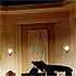 Close-up detail of a stage set - a classical interior with a carved stone wall-panel