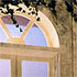 Close-up detail of a stage set - a stone balustrade and urn