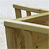 Close-up detail of a pale coloured wooden chair