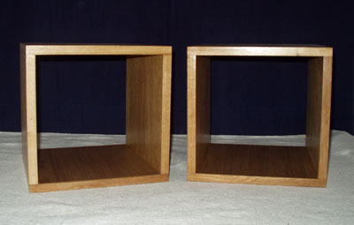 Front view of a pair of bedside tables in the form of a cube with open back and front