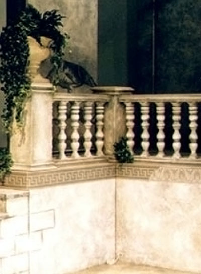 view of stage set - close up detail of a stone urn and balustrade