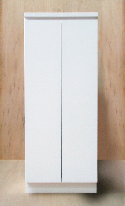Front view of a white cabinet with the doors closed